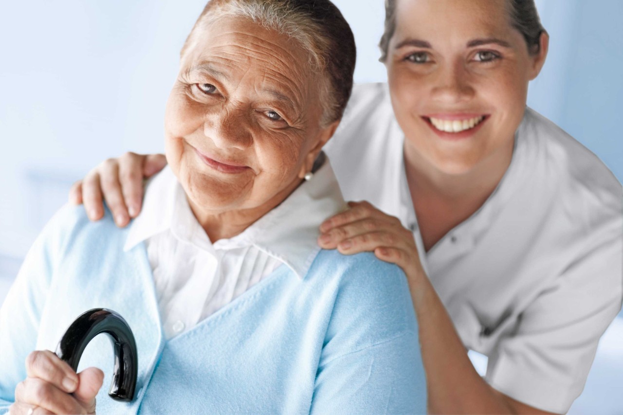 Portrait of a happy nurse and patient